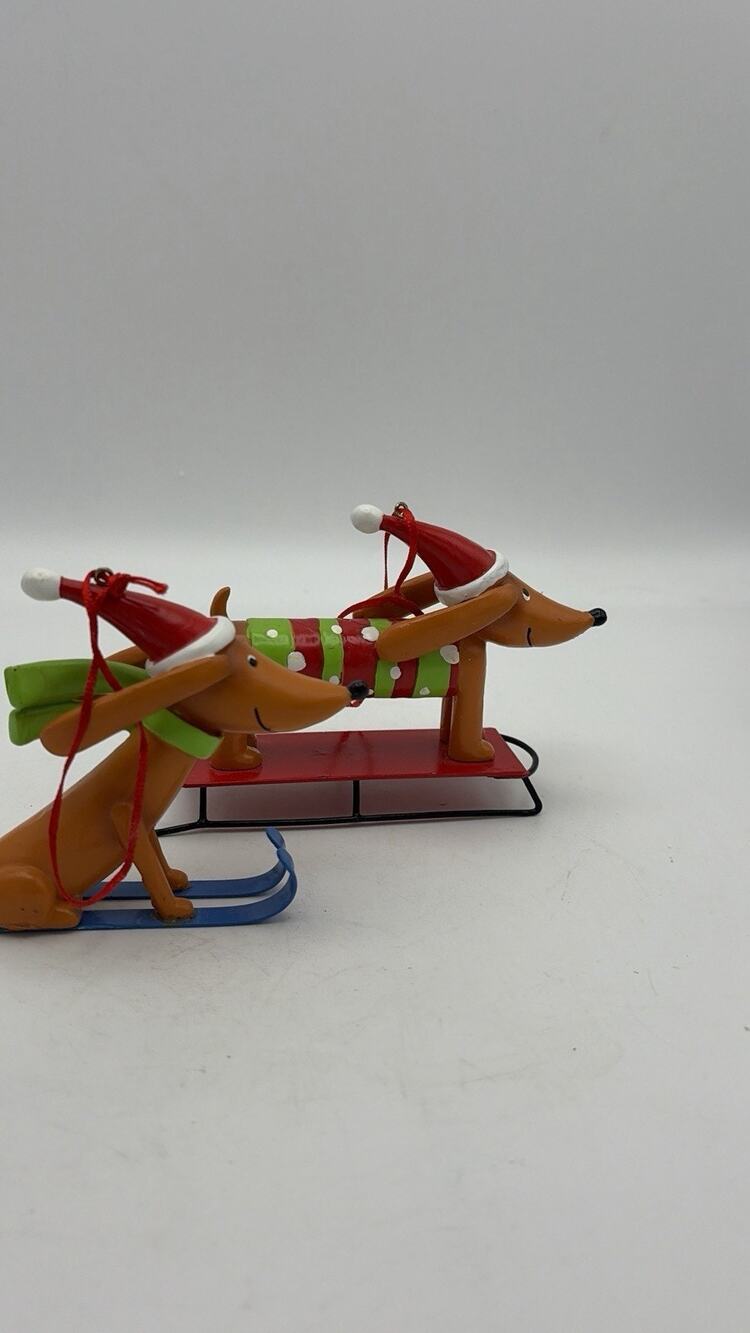 Two Doxy Dogs. One On Skis And One On A Sled. Originally From Target.